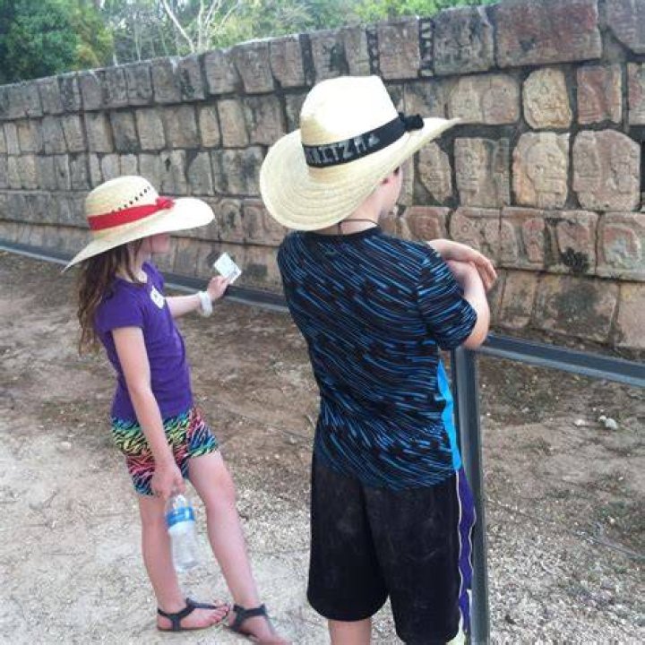 Cooling down:&nbsp;She and Chris were seen walking around in the waves with water up to their necks at one point