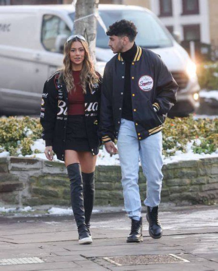 Kayla Richart Wearing a Black Miniskirt and Thigh High Boots London
