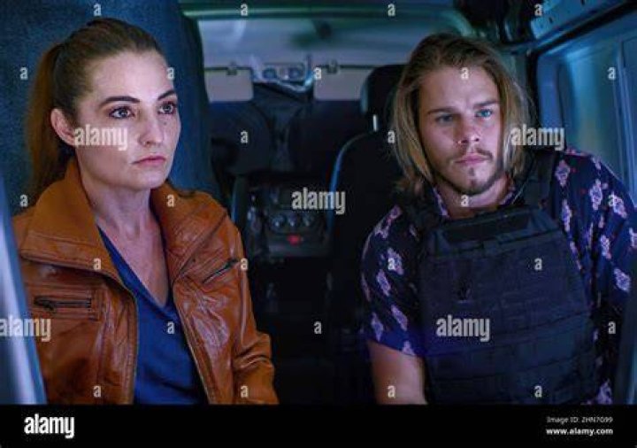 PURSUIT, from left Laurie Love, Jake Manley, 2022. &copy; Lionsgate