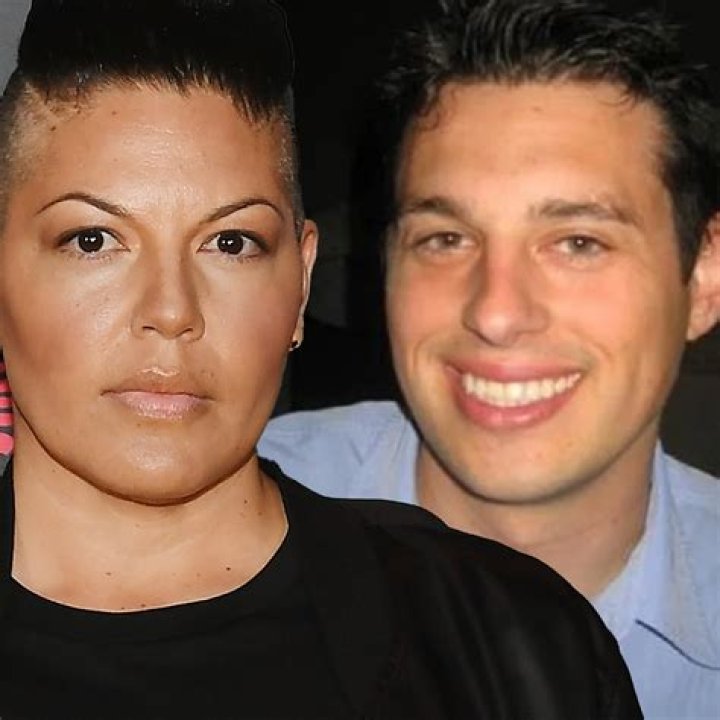 Ryan DeBolt and wife, Sara Ramirez Callie Torres, Red Suit, Latest